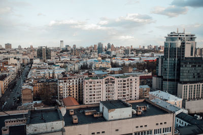 High angle view of buildings in city against sky