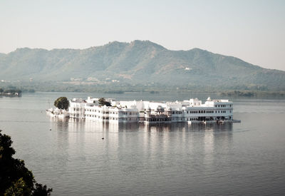 Scenic view of bay against clear sky