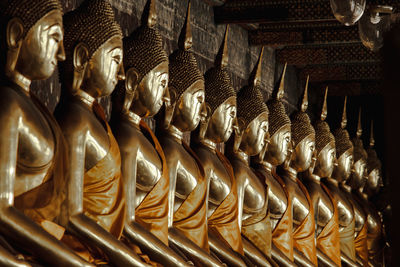 Buddha statue in temple outside building