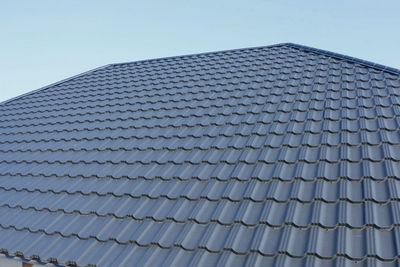 Low angle view of modern building against sky