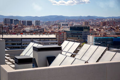 High angle view of buildings against sky