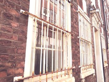 Low angle view of window in old building