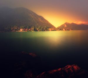 Scenic view of lake during sunset