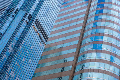 Low angle view of modern glass building