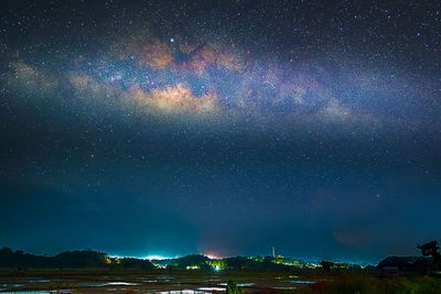 Scenic view of illuminated star field against sky at night