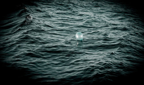 High angle view of buoy in sea