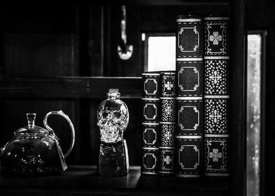 Close-up of glass bottles on table