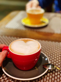 Coffee cup on table