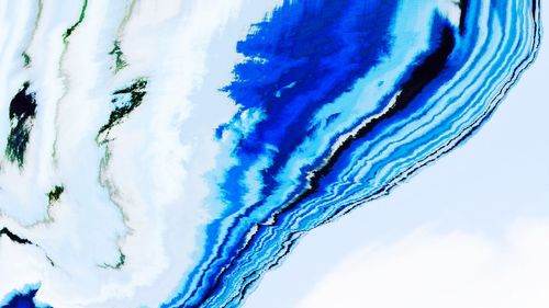 Low angle view of blue sea against sky