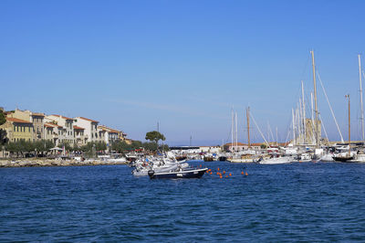 Scenic view of sea against clear blue sky