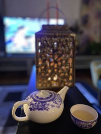 Close-up of coffee cup on table