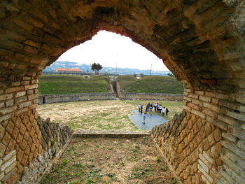 People in a archway