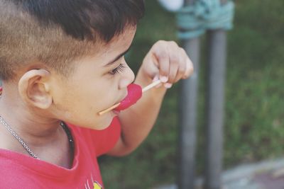 Close-up of boy holding ice cream