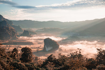 Scenic view of mountains against sky during sunset