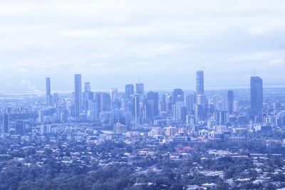 Modern buildings in city against sky