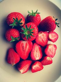 High angle view of strawberries in plate