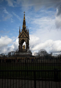 Low angle view of historical building against cloudy sky