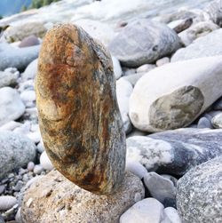 High angle view of stones on pebbles