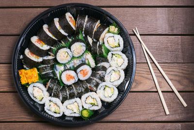Directly above shot of sushi served on plate