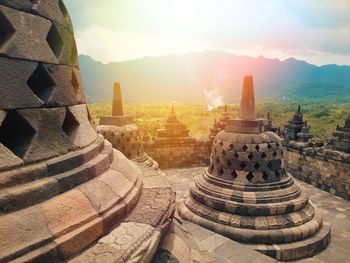 Panoramic view of temple against building