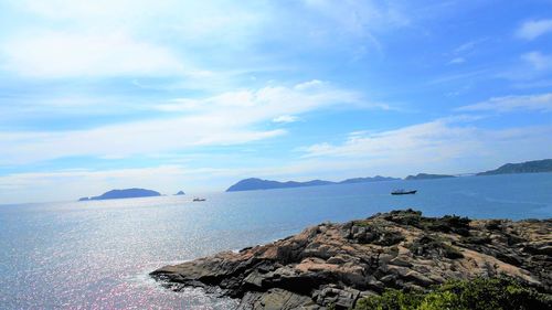 Scenic view of bay against sky