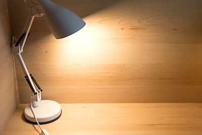 High angle view of electric lamp on table
