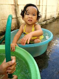 Close-up of boy playing in water