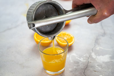 Close-up of hand holding drink