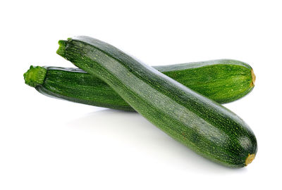 Close-up of green pepper against white background