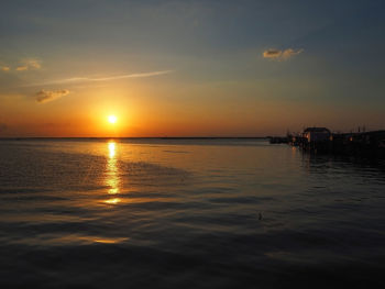 Scenic view of sea at sunset