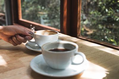 Coffee cup on table