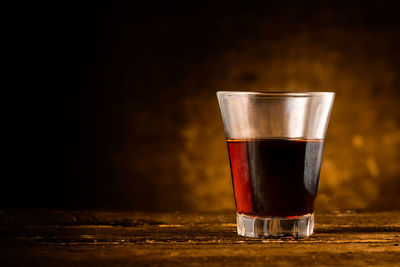 Close-up of beer glass on table