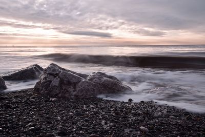 Scenic view of sea against sky during sunset