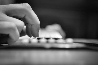 Close-up of person playing guitar 