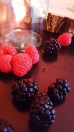 Close-up of red berries on table