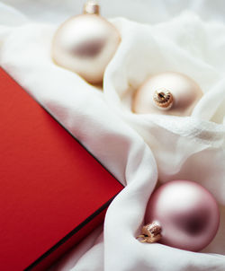 Close-up of wedding rings on table