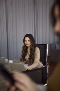 Businesswoman at work using laptop