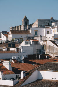 High angle view of houses in city