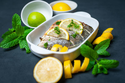 Close-up of fish served on table