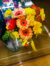 Close-up of yellow flowers in vase