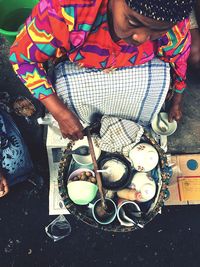 High angle view of people holding ice cream