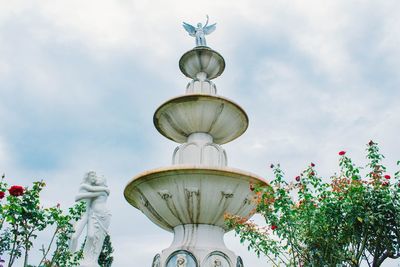 Low angle view of statue against sky