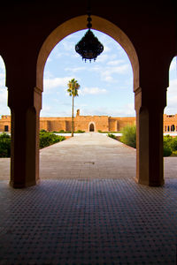 Footpath leading towards historic building