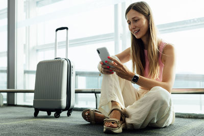 Young woman using mobile phone