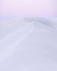 Scenic view of snowcapped mountain against sky