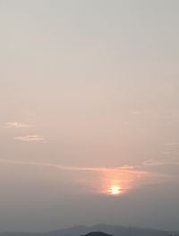 Silhouette landscape against sky during sunset