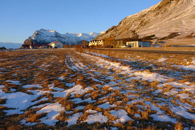 Scenic view of snowcapped mountains against clear sky