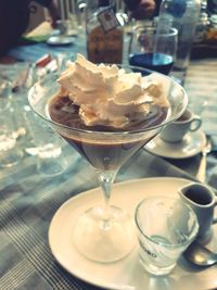 Close-up of ice cream in glass on table