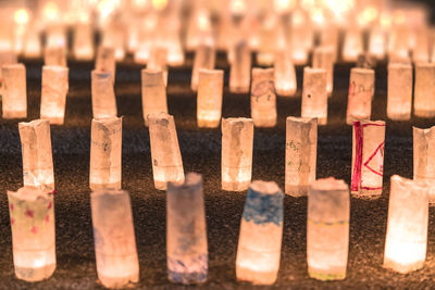 Handmade japanese paper washi lanterns illuminating the stone steps of the zojoji temple.