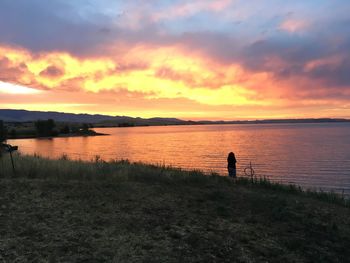 Scenic view of calm sea at sunset